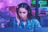 Developer, computer or headphones in neon coding for cybersecurity iot, night SEO thinking or code .